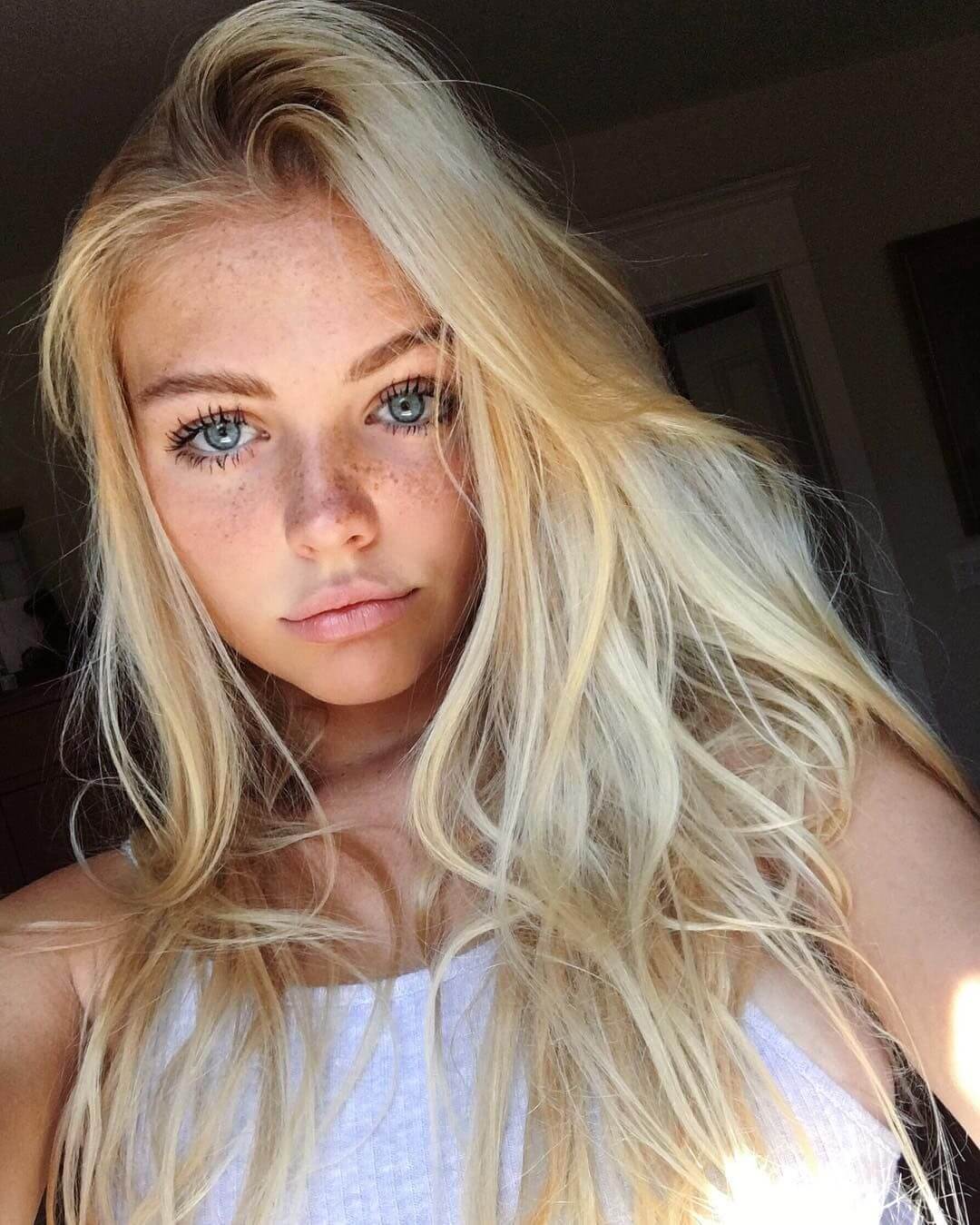 Creamy Blonde Hair Color With Blue Eyes