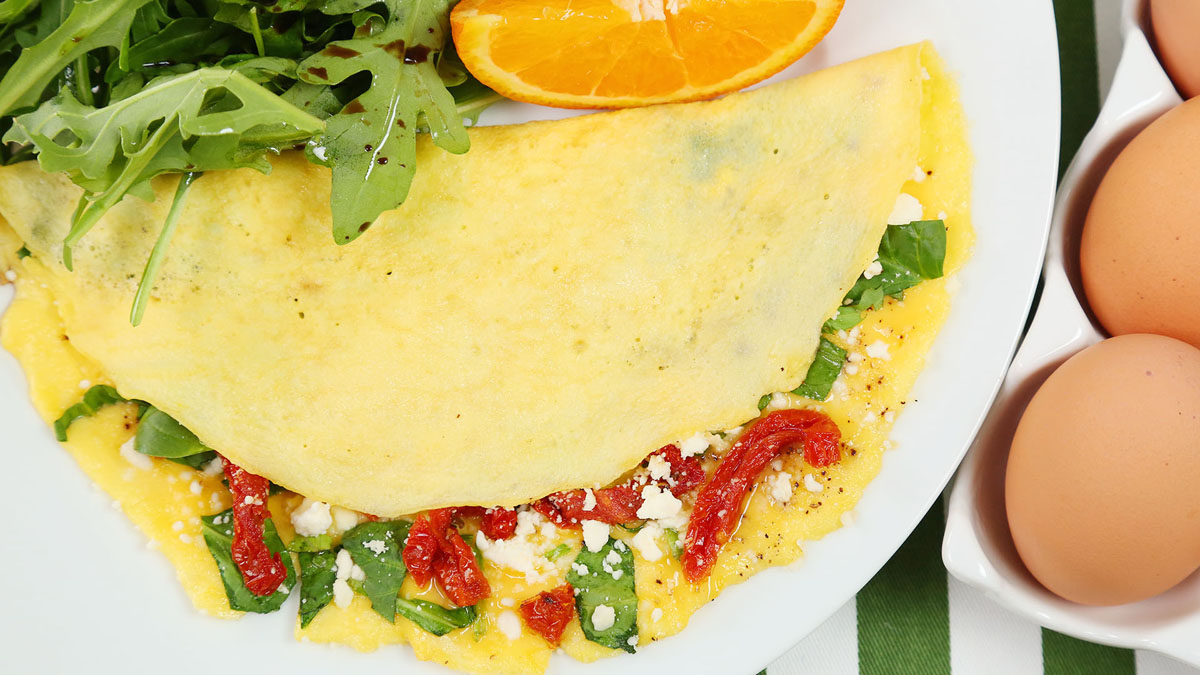 Eggs and spinach omelette with feta cheese 