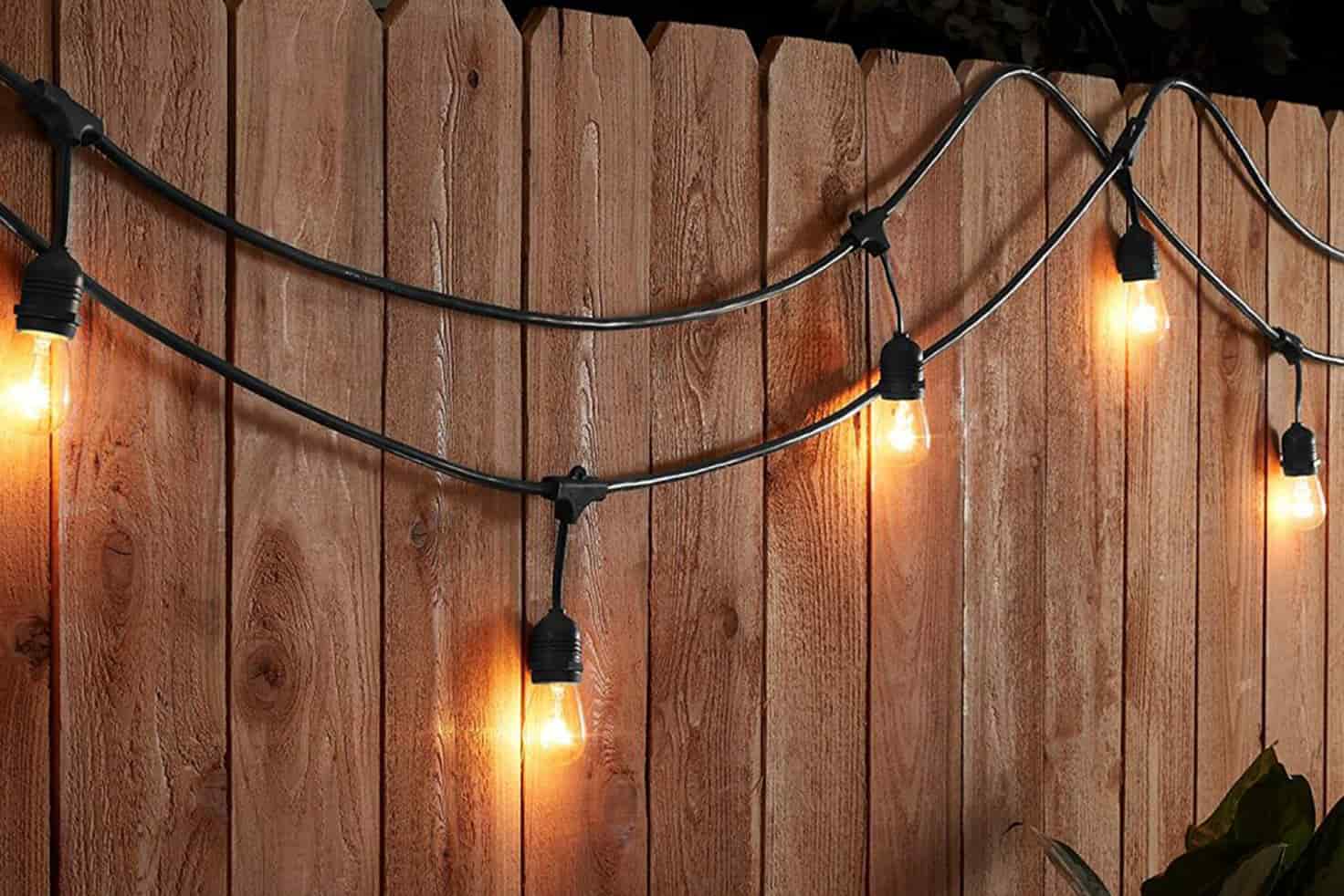 Festoon Lights hanging on wooden fence - shein home decor ideas