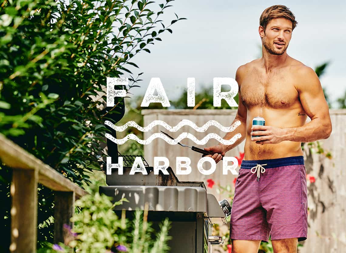 a man wears fair harbor swim trunks at backyard bbq party - fair harbor swim trunks review - where to buy fair harbor swim trunks